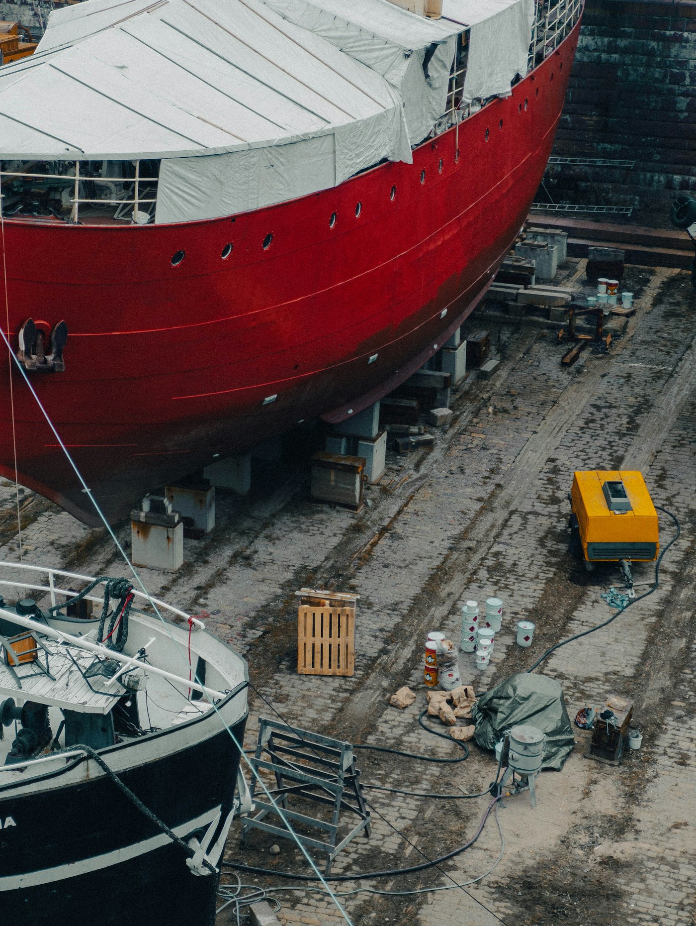 Vessel undergoing maintenance in dry dock
